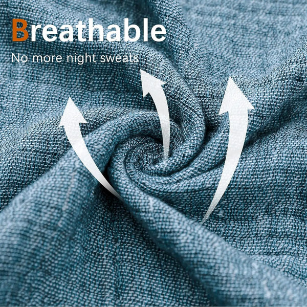 A close-up of a blue-green breathable muslin throw blanket fabric being twisted.