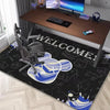 A black area rug featuring a neon hexagon design with blue and white accents for a gaming space.