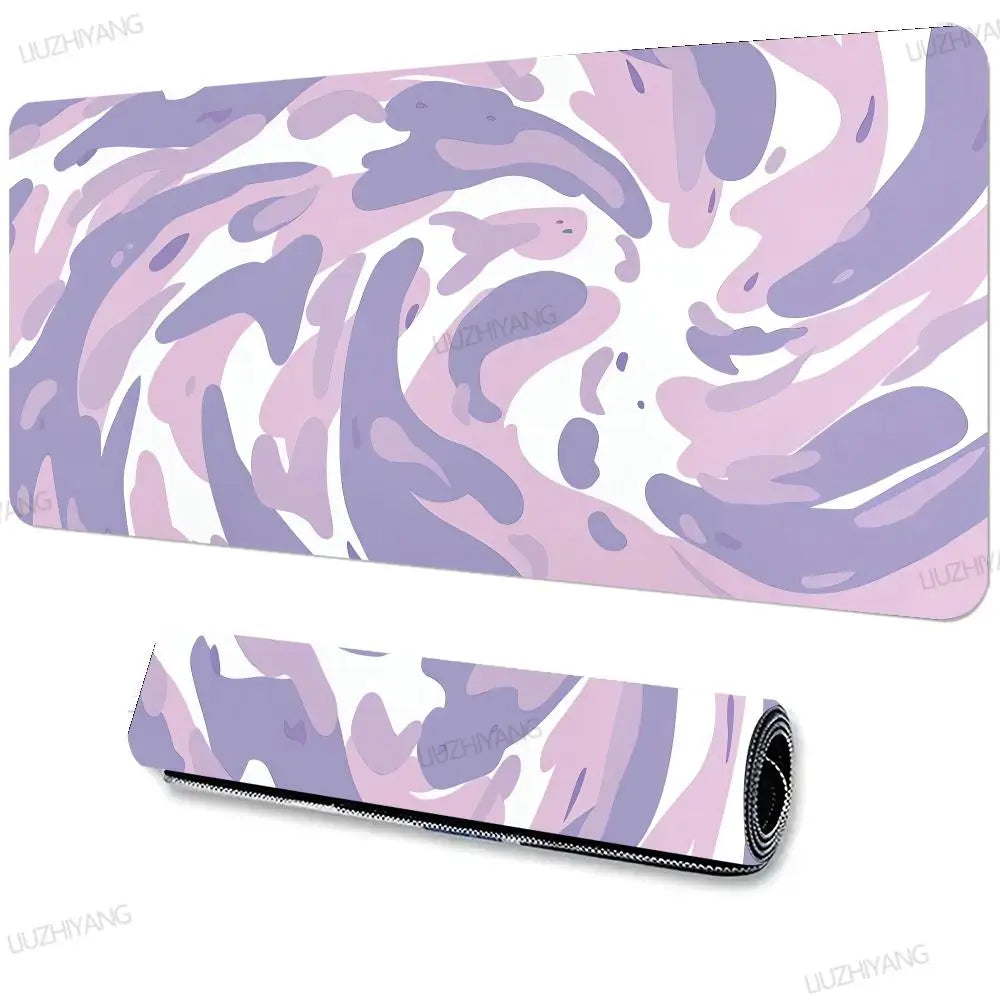A purple and pink marbled art vortex mouse pad with a non-slip rubber base.