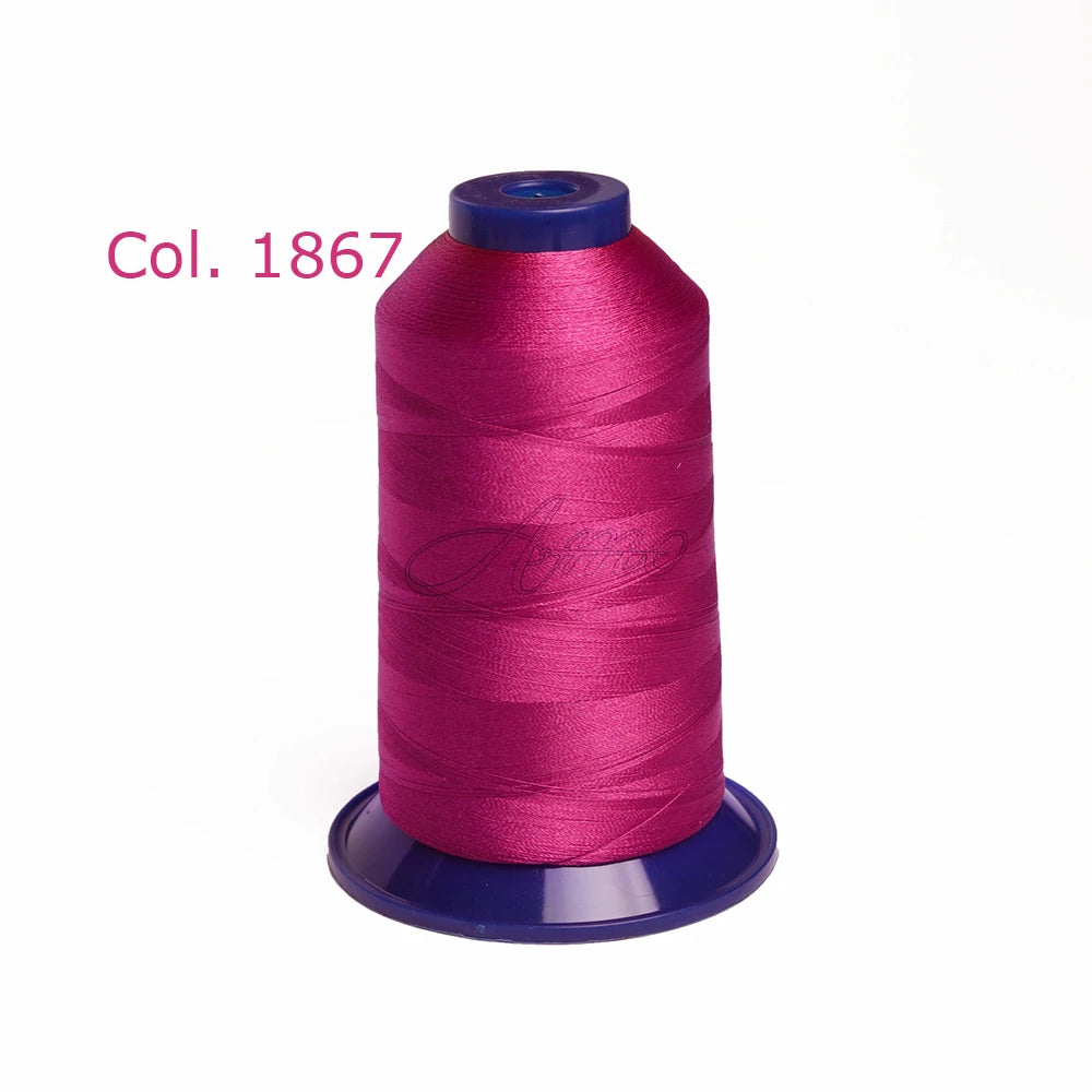 A spool of magenta embroidery thread labeled Col. 1867.