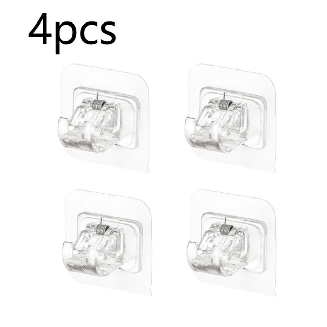 Four clear plastic nail-free adjustable curtain rod hooks for hanging curtains.
