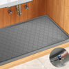A silicone under sink cabinet liner installed in a wooden cabinet, showing its textured surface and installation.
