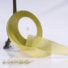 A roll of gold glitter organza ribbon used for gift wrapping and DIY crafts.