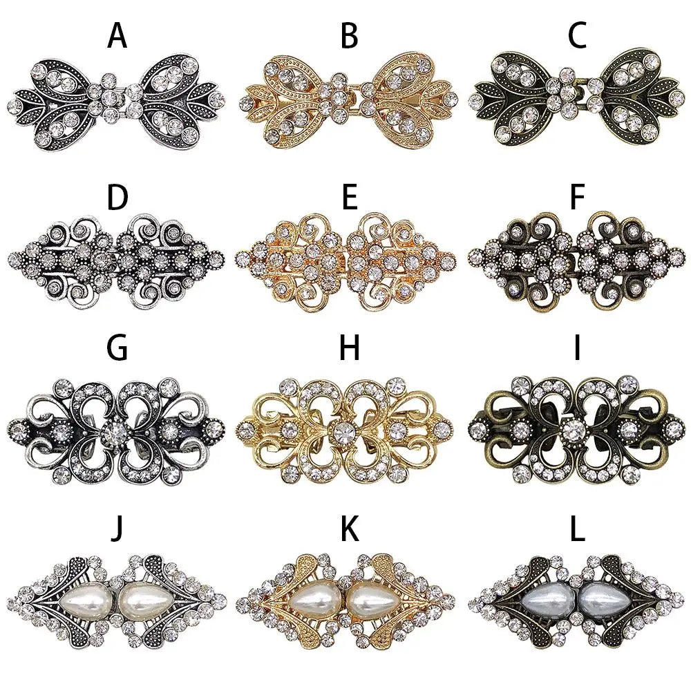 A collection of twelve vintage swirl clip brooches in silver and gold tones.