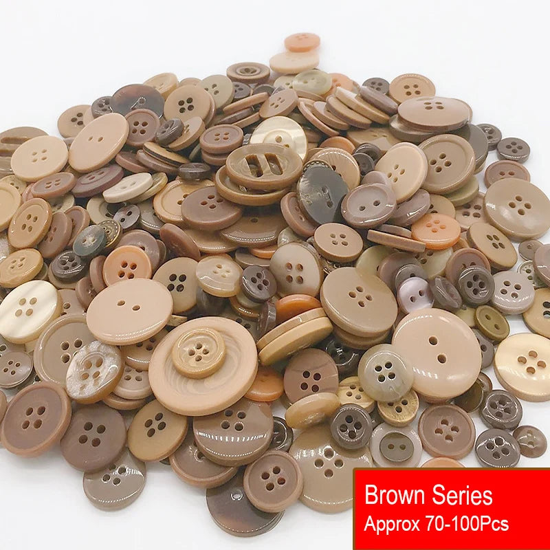A pile of assorted brown resin sewing buttons for crafting and DIY projects.