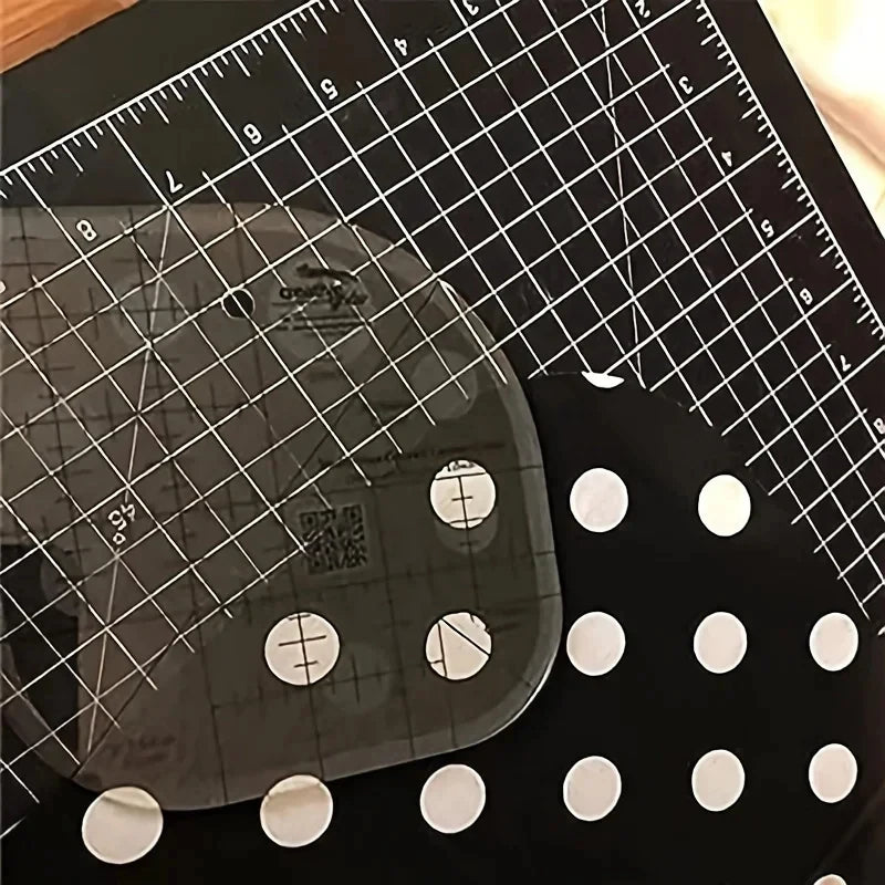 A clear acrylic quilting ruler with corner templates is shown on a black background.