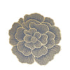 A detailed illustration of a gold-plated peony flower design with radiating lines on a dark gray background.