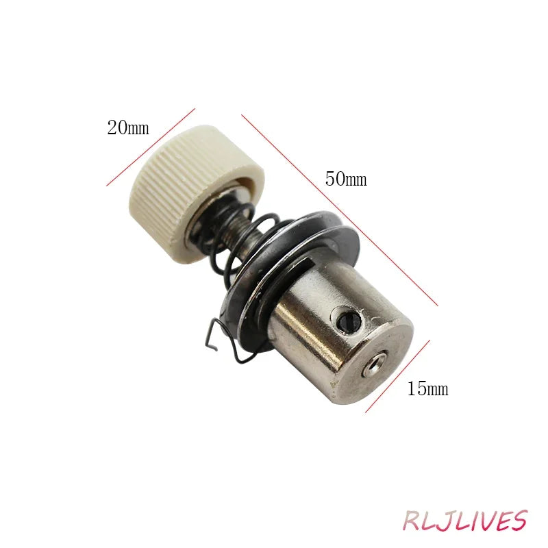 A close-up view of a universal sewing machine gripper with a white plastic collar and metal body.