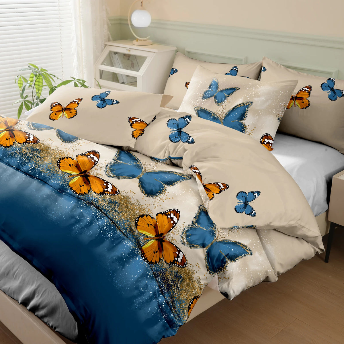 A set of butterfly print brushed duvet cover and pillowcases in blue, orange, and cream tones.