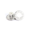 Silver metal button with a decorative leaf and star pattern for clothing