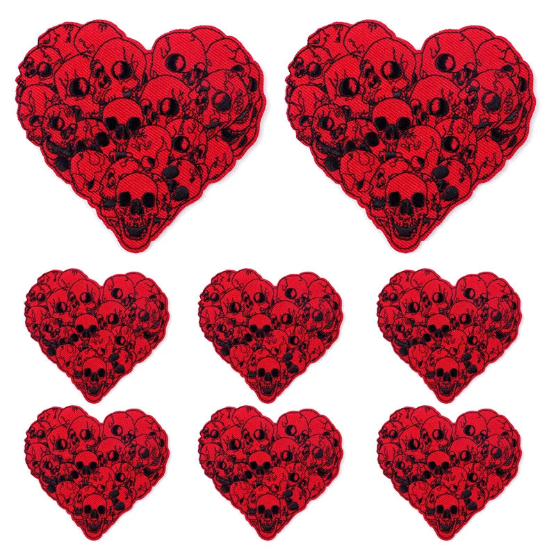 Red heart shaped embroidery patches featuring skull designs for DIY punk clothing