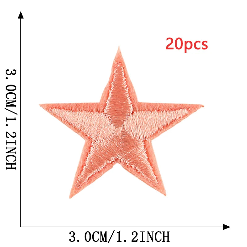A close-up view of a peach-colored five-pointed star embroidery patch, measuring 3cm by 1.2 inches.