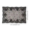 Black spider web lace table runner featuring intricate black netting and foliage design