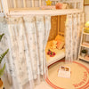 A double-layer mesh bed canopy with lace trim featuring sheer white fabric and floral patterns.