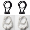 A set of four black magnetic curtain tiebacks, including two looped and two square-shaped.