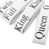 White fabric straps with text like Win Full King and Queen for an adjustable bed sheet organizer