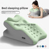 A green and gray ergonomic prostrate pillow is shown next to a woman using it for bedtime gaming and binge-watching.