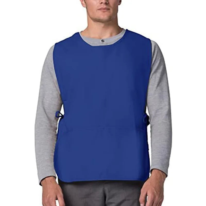 A man wearing a royal blue versatile polyester apron over a gray long-sleeved shirt.