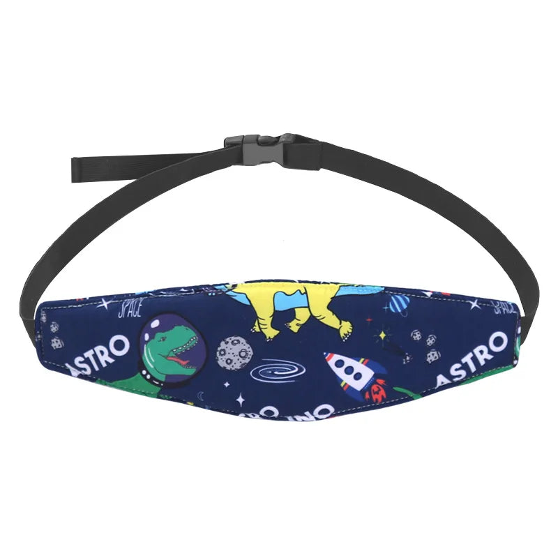 A dark blue baby car seat head support pillow with space and astronaut designs attached to a black adjustable strap.