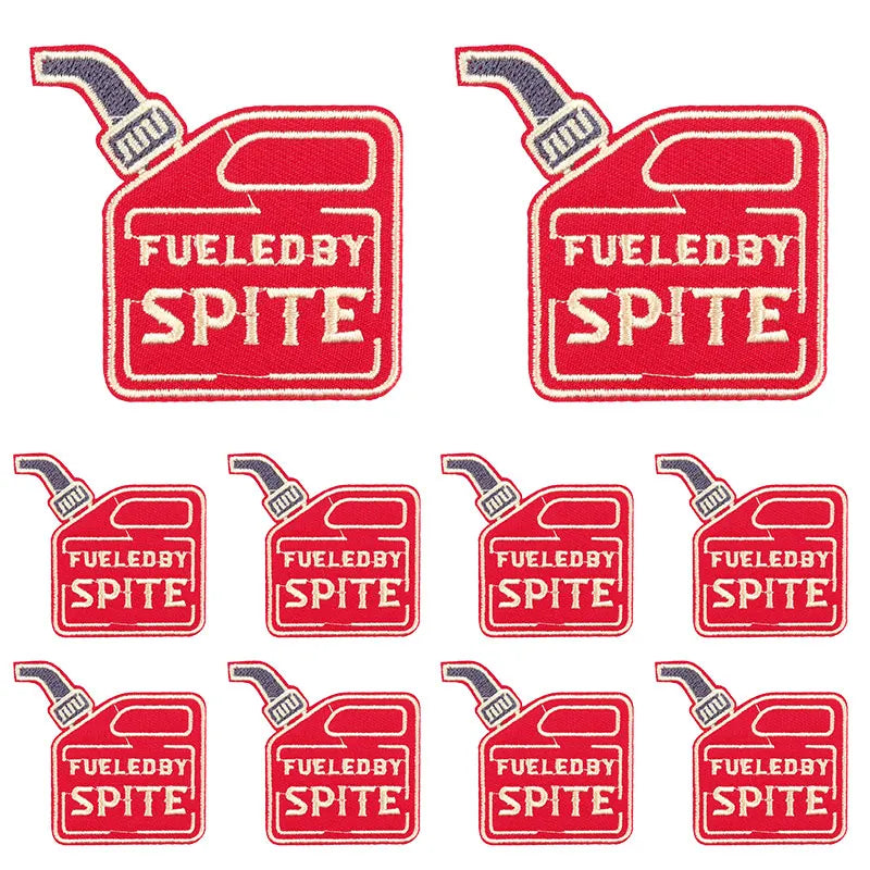 Red embroidered applique patches featuring the Fueledby Spite slogan on a fabric background.