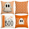 Set of four Halloween cushion covers featuring ghost, pumpkin, and skull designs in orange and white stripes.