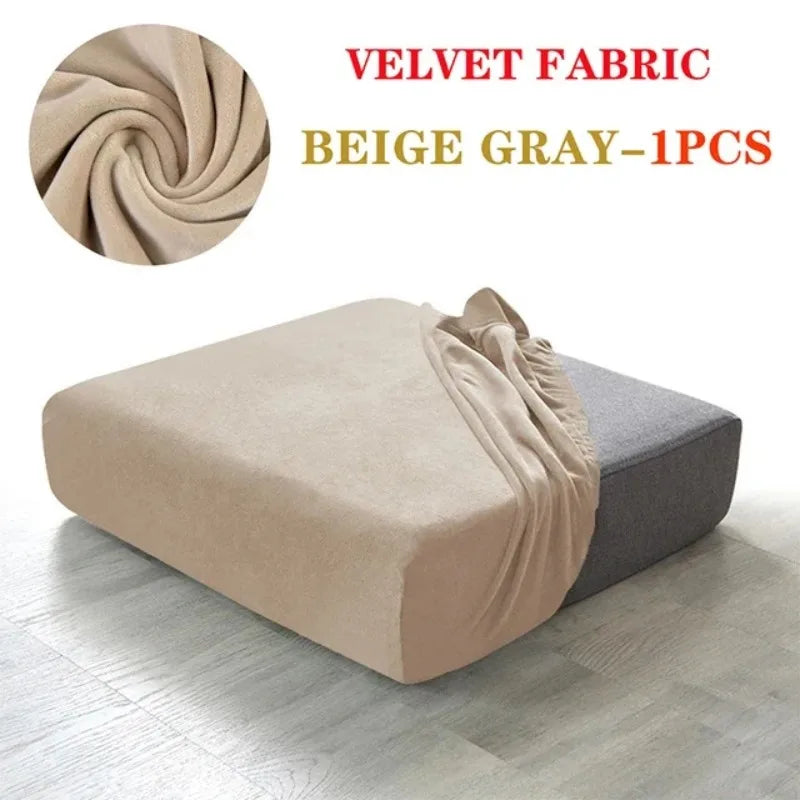 Beige gray velvet fabric sofa seat covers shown draped on a modern sofa.