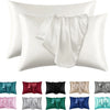 A set of satin pillowcases in various colors including green, pink, purple, red, black, silver, and blue.