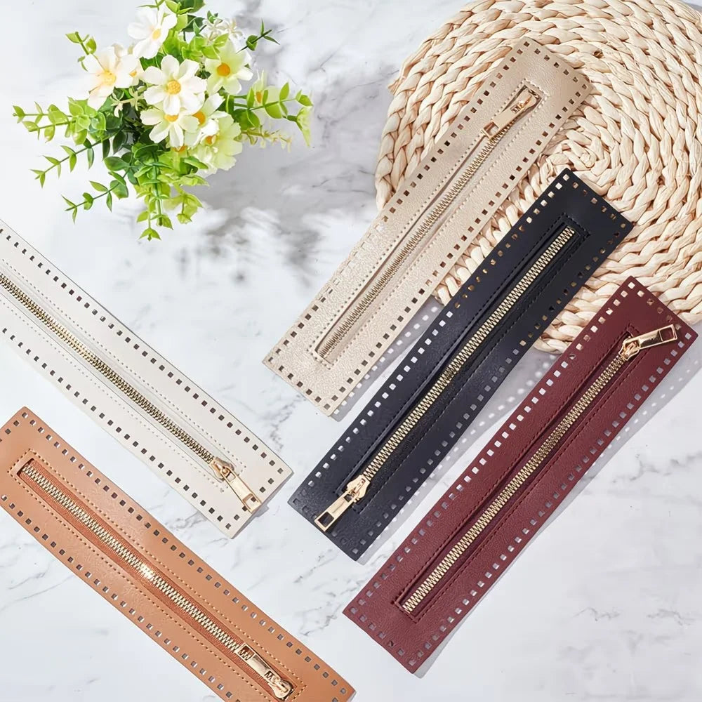 A collection of PU leather zipper frames in various colors and finishes laid on a white marble surface.