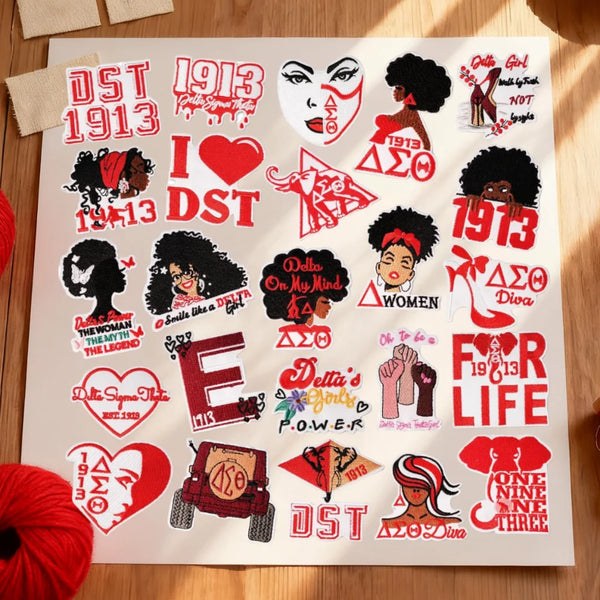 A collection of embroidered iron-on patches featuring designs like hearts, silhouettes, and text for DIY crafting.