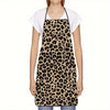 A woman wearing a sleeveless leopard print kitchen apron over a white shirt.