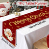 A red festive Santa Christmas table runner displayed on a white tablecloth with a Christmas tree in the background.