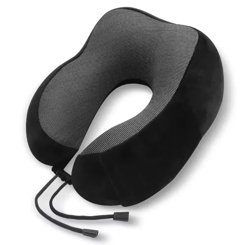 Black ergonomic memory foam neck pillow with a mesh cover and adjustable strap.