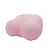 A pink memory foam contour chest pillow shown from the side.