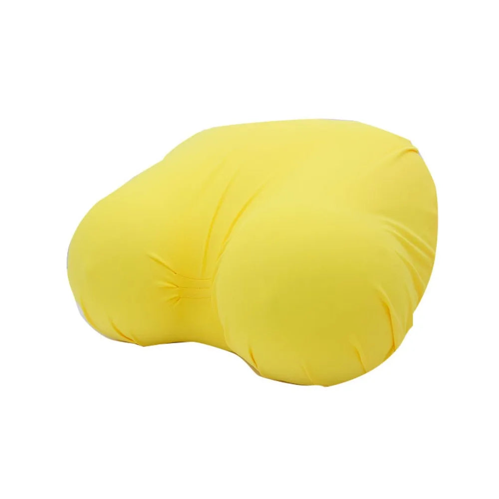 A yellow memory foam contour chest pillow shown from the side.
