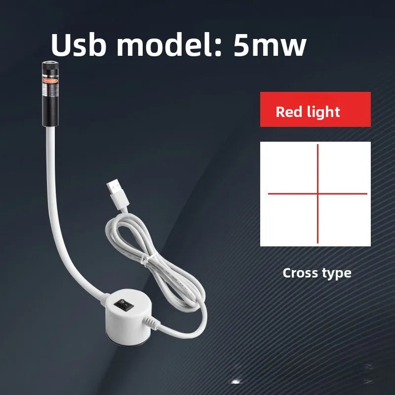 A white USB laser positioning light with a red light feature and cross type connector is shown against a dark background.