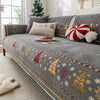 Gray sofa seat covers decorated with gold and red foliage patterns and white accents