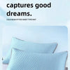 Light blue quilted pillowcases shown on a white surface.