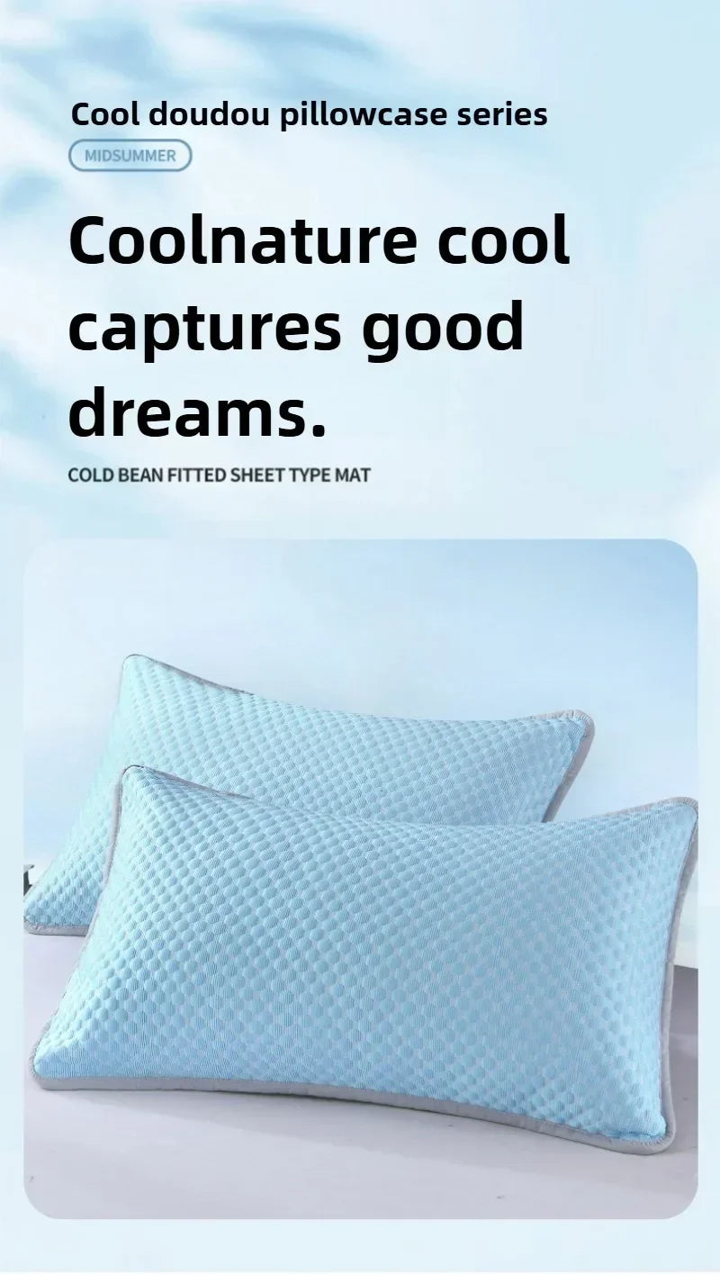 Light blue quilted pillowcases shown on a white surface.