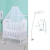 White foldable mosquito net canopy installed over an infant cot in a light green room.