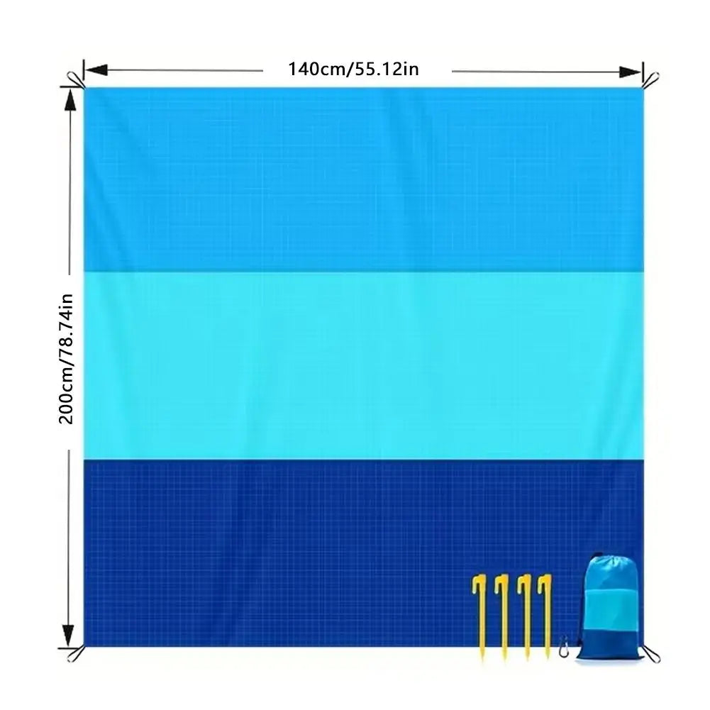 A rectangular blue and teal outdoor picnic mat featuring horizontal color stripes.