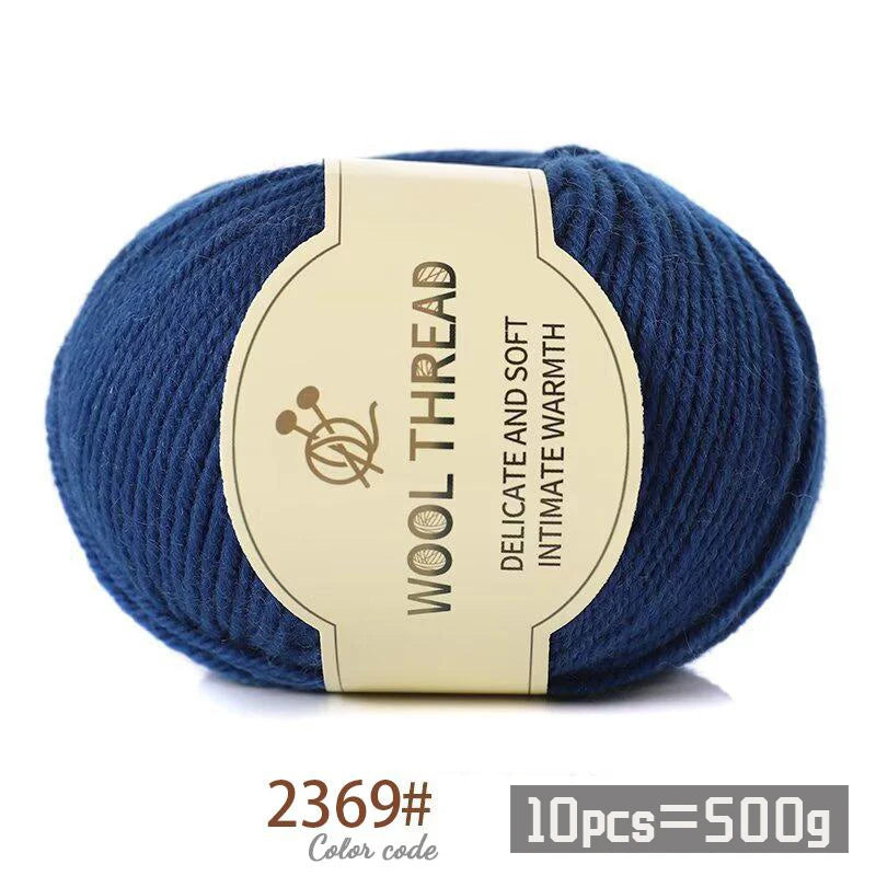A ball of dark blue wool thread with a label indicating 2369 color code and 10 pieces equal to 500g