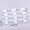 White organizer straps with labels Full, King, Queen, and Twin