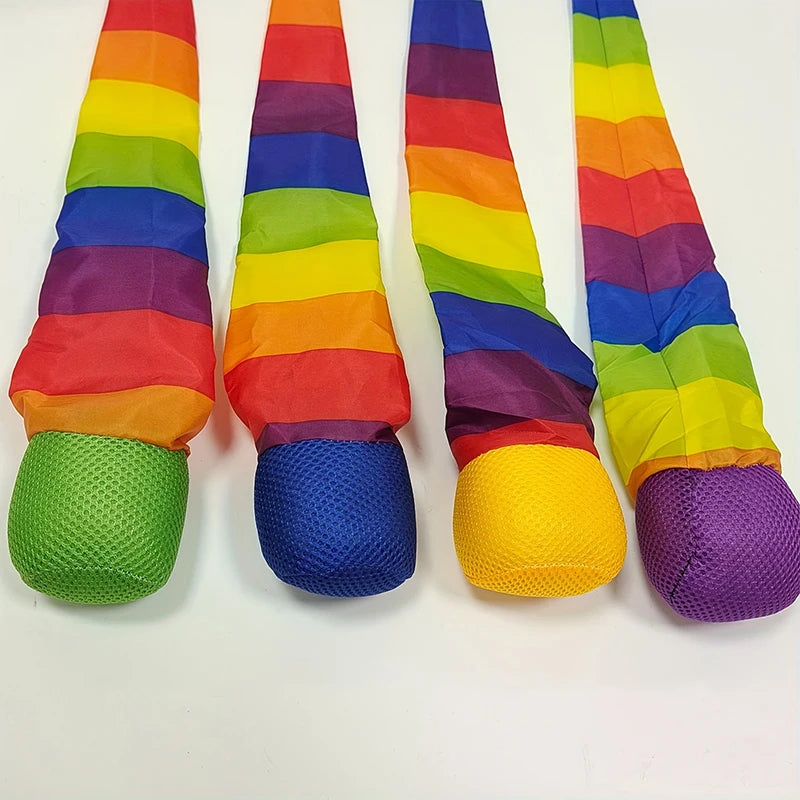 Rainbow comet ball with a soft, colorful tail featuring a gradient of rainbow colors.