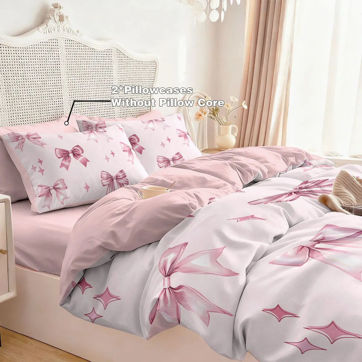 Pink bow printed duvet cover set featuring a pink duvet and pillowcases with white accents.