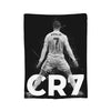 A black and white graphic featuring a football player's back with the name ROMALDO and number 7 on a vintage knit throw blank