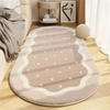 A beige seasonal decor rug with a subtle geometric pattern lies on a light wooden floor next to a sofa.