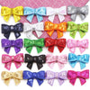 Assortment of sparkly and glittery bow patches in various colors for DIY decoration