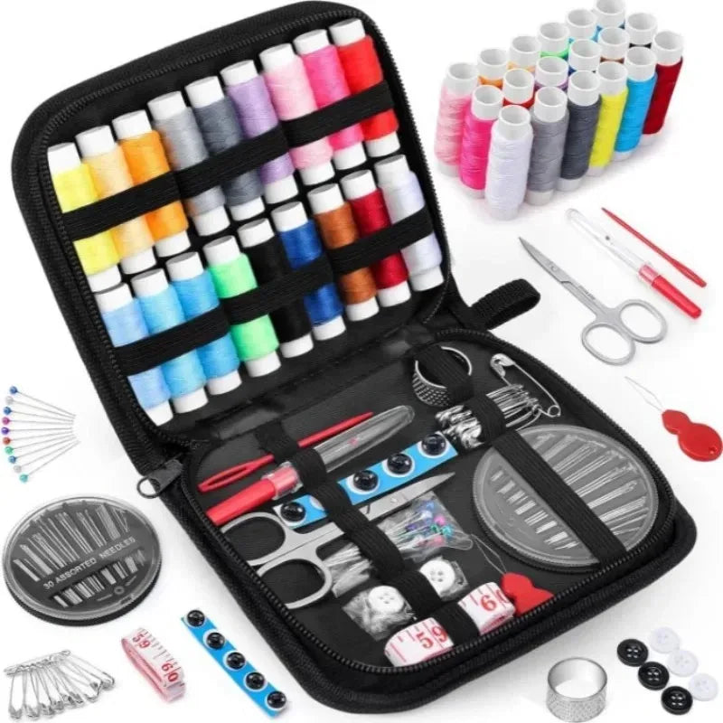 A black sewing kit case containing various hand sewing needles, thread, and small scissors.
