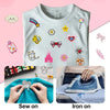 A white t-shirt featuring assorted colorful cartoon embroidery patches for DIY and apparel projects.