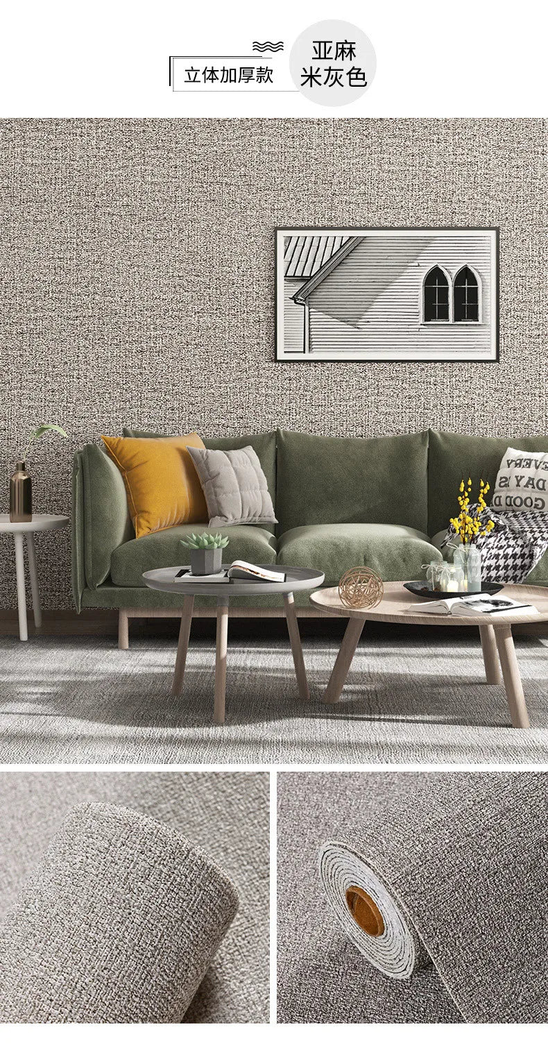 A gray linen texture wallpaper is shown on a wall, with a green sofa and wooden furniture in the foreground.